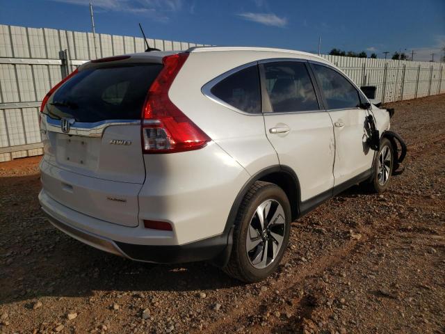 Photo 4 from auction – 2016 HONDA CR-V TOURI with VIN 5J6RM4H91GL030116