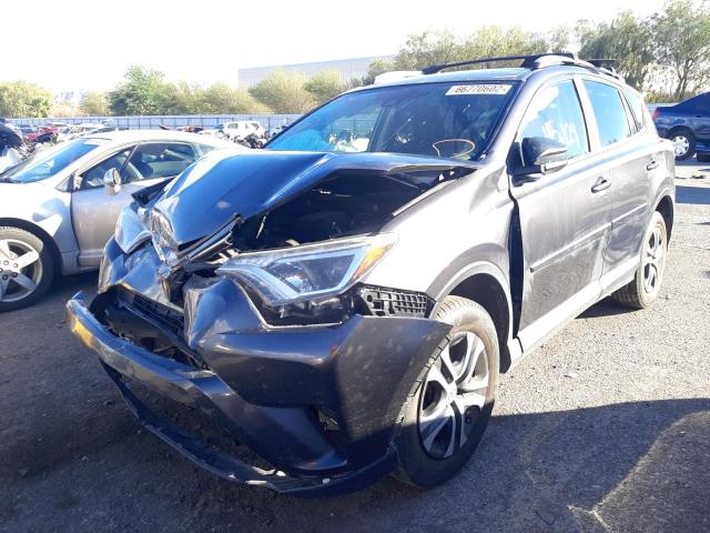 Photo 2 from auction – 2017 TOYOTA RAV4 LE with VIN JTMZFREV2HJ704835