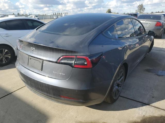 Photo 4 from auction – 2021 TESLA MODEL 3 with VIN 5YJ3E1EB3MF939133