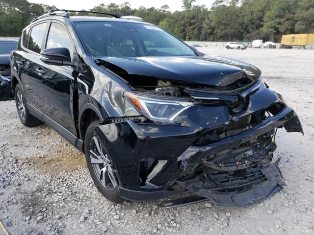TOYOTA RAV4 XLE 2017 with VIN 2T3WFREV1HW351623 - Photo from auction