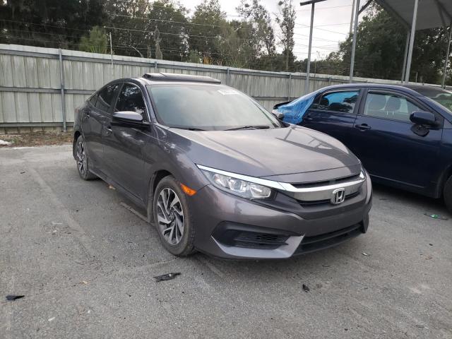 HONDA CIVIC EX 2018 with VIN 2HGFC2F78JH602709 - Photo from auction
