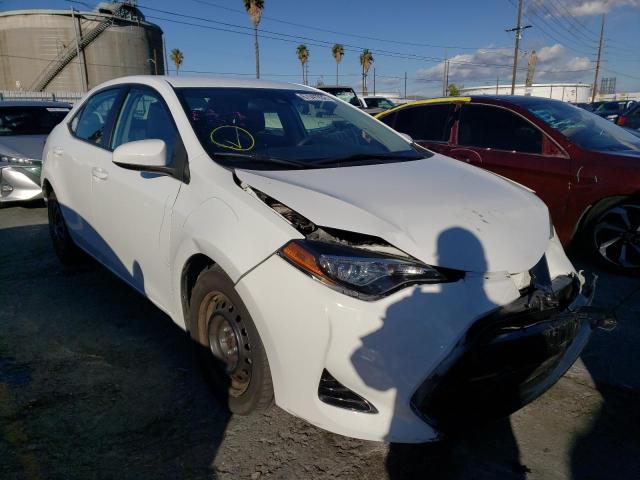 TOYOTA COROLLA L 2017 with VIN 5YFBURHE7HP698304 - Photo from auction