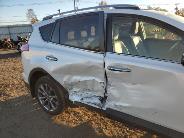 Photo 9 from auction – 2018 TOYOTA RAV4 LIMIT with VIN JTMDFREV0JJ736439