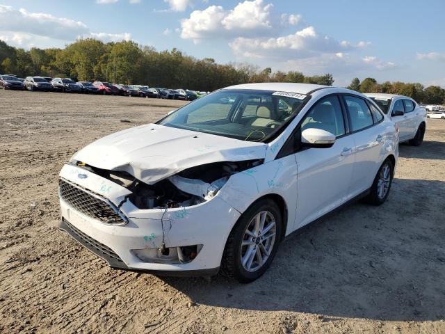 Photo 2 from auction – 2015 FORD FOCUS SE with VIN 1FADP3F2XFL263357