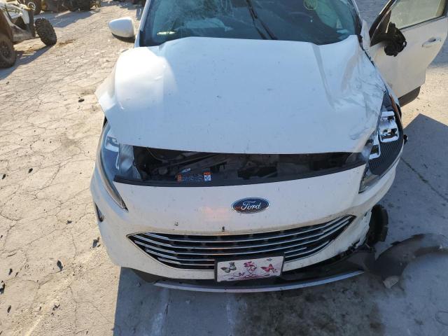 Photo 7 from auction – 2021 FORD ESCAPE TIT with VIN 1FMCU9J90MUA63838