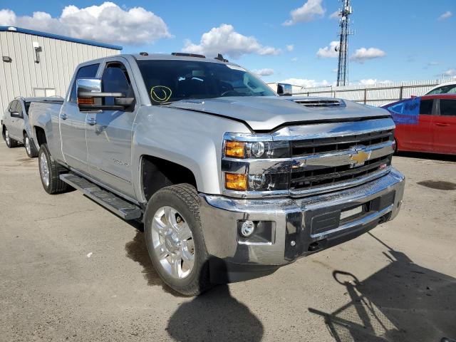 CHEVROLET SILVERADO 2018 with VIN 1GC1KWEY4JF149543 - Photo from auction