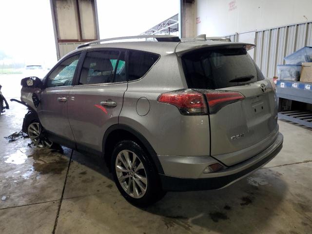 Photo 3 from auction – 2018 TOYOTA RAV4 LIMIT with VIN JTMYFREV4JD125135