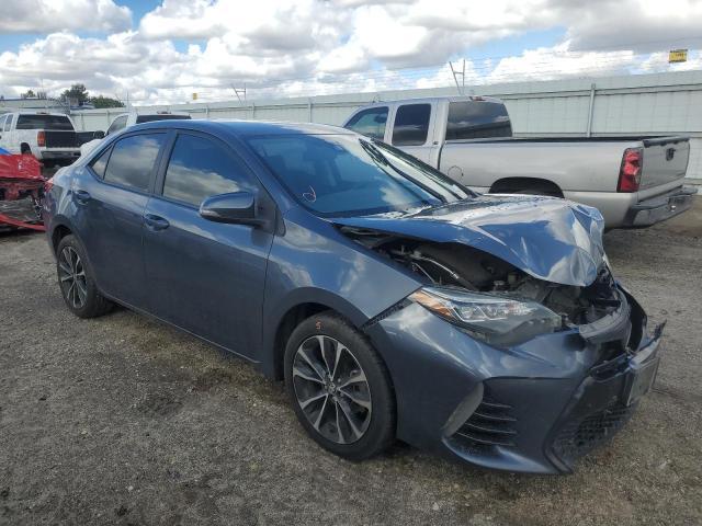 TOYOTA COROLLA L 2018 with VIN 5YFBURHE6JP801301 - Photo from auction