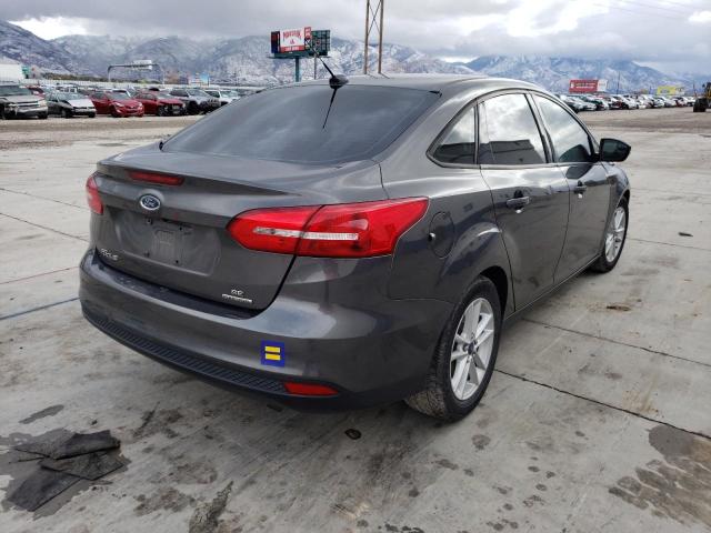 Photo 4 from auction – 2015 FORD FOCUS SE with VIN 1FADP3F25FL220545