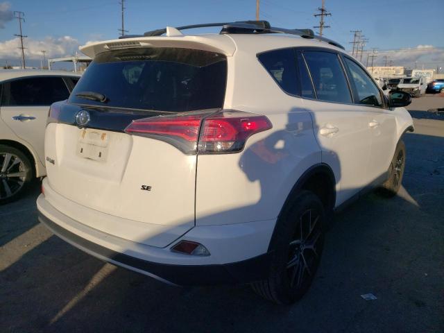 Photo 4 from auction – 2017 TOYOTA RAV4 SE with VIN JTMNFREV3HJ706303
