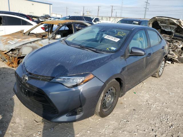 Photo 2 from auction – 2017 TOYOTA COROLLA L with VIN 5YFBURHE7HP679588