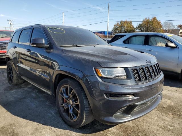 JEEP GRAND CHER 2015 with VIN 1C4RJFDJ2FC609611 - Photo from auction