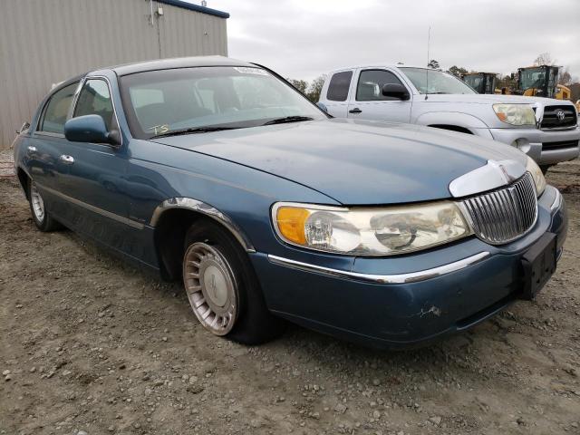Photo 1 from auction – 2001 LINCOLN TOWN CAR E with VIN 1LNHM81W41Y630319