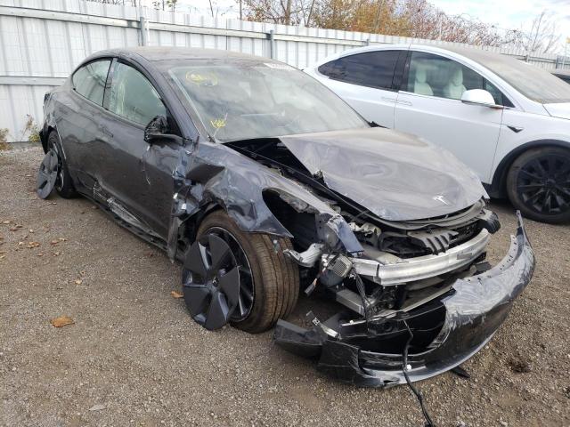 TESLA MODEL 3 2022 with VIN 5YJ3E1EB8NF323767 - Photo from auction