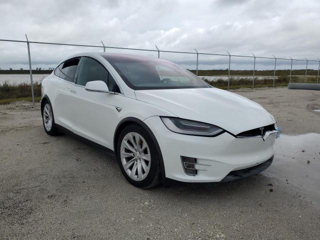 TESLA MODEL X 2020 with VIN 5YJXCDE26LF230770 - Photo from auction