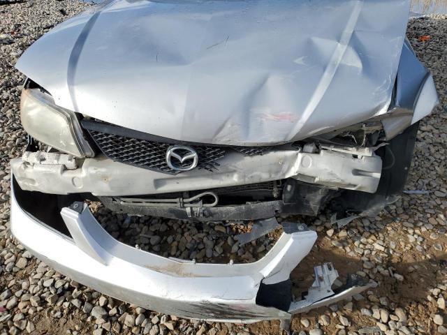 Photo 9 from auction – 2003 MAZDA PROTEGE DX with VIN JM1BJ225X30149546
