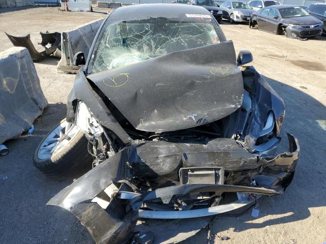 Photo 5 from auction – 2022 TESLA MODEL 3 with VIN 5YJ3E1EA8NF188636