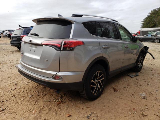 Photo 4 from auction – 2018 TOYOTA RAV4 LE with VIN JTMZFREV0JJ159904