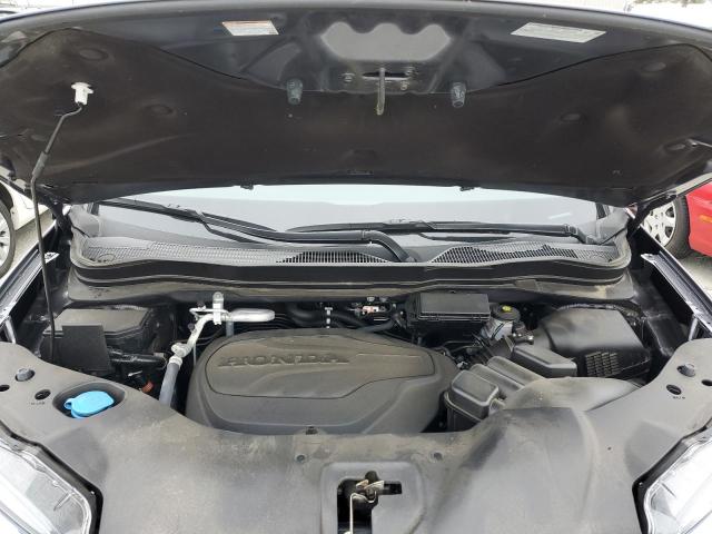 Photo 7 from auction – 2021 HONDA PILOT TOUR with VIN 5FNYF5H67MB030661