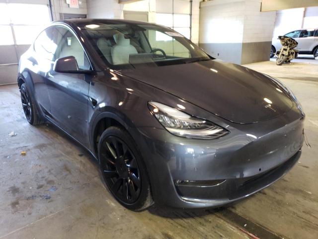 TESLA MODEL Y 2021 with VIN 5YJYGAEE8MF158229 - Photo from auction