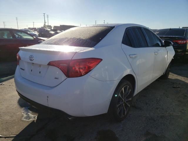 Photo 4 from auction – 2017 TOYOTA COROLLA L with VIN 5YFBURHE1HP611318