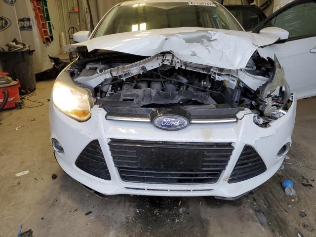 Photo 9 from auction – 2012 FORD FOCUS SE with VIN 1FAHP3F22CL444739