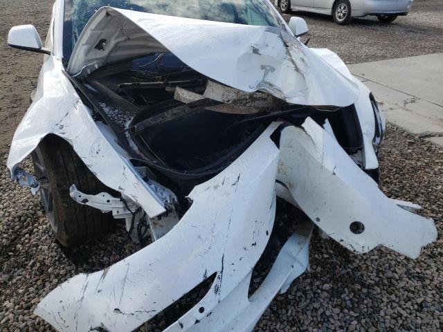 Photo 9 from auction – 2022 TESLA MODEL 3 with VIN 5YJ3E1EBXNF194060