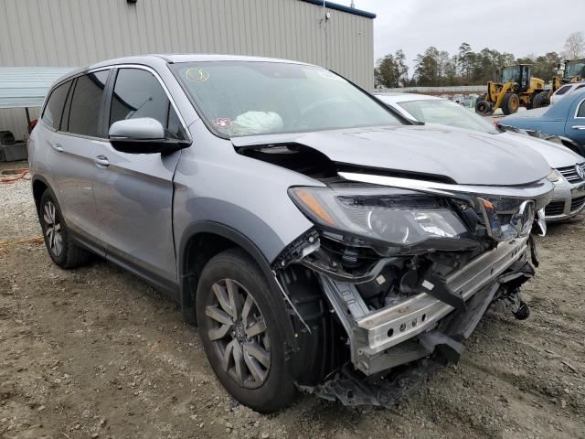 HONDA PILOT EXL 2021 with VIN 5FNYF5H5XMB018897 - Photo from auction