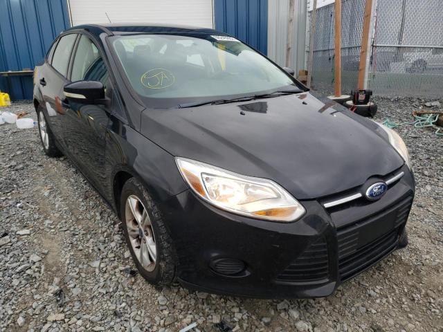FORD FOCUS SE 2014 with VIN 1FADP3F28EL303773 - Photo from auction
