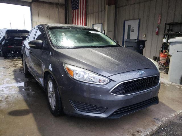 FORD FOCUS SE 2015 with VIN 1FADP3F26FL252307 - Photo from auction