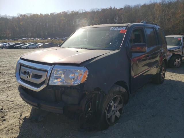 Photo 2 from auction – 2011 HONDA PILOT TOUR with VIN 5FNYF4H96BB029177