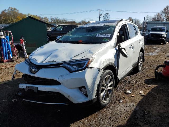 Photo 2 from auction – 2016 TOYOTA RAV4 LIMIT with VIN 2T3DFREV3GW536049