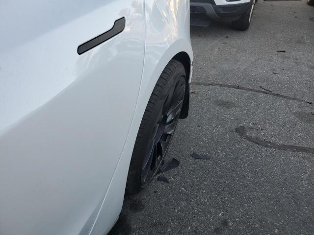 Photo 9 from auction – 2022 TESLA MODEL 3 with VIN 5YJ3E1EC5NF344147