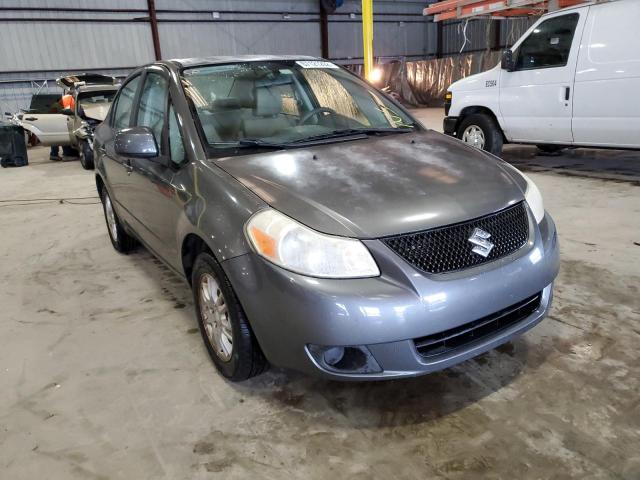 SUZUKI SX4 LE 2012 with VIN JS2YC5A32C6302672 - Photo from auction