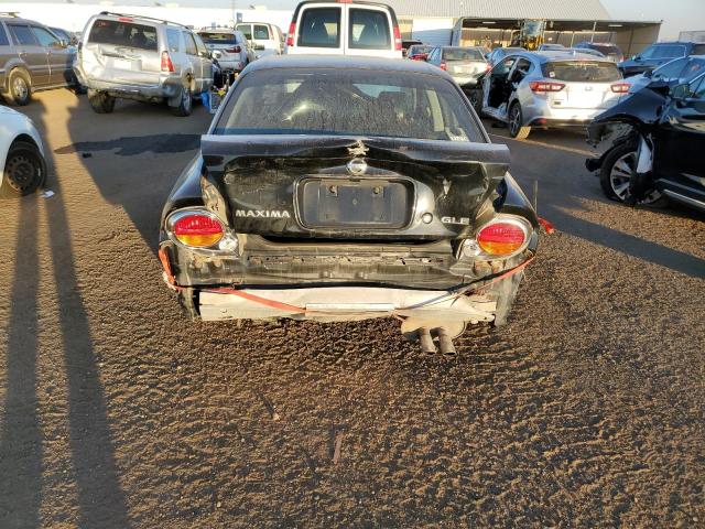 Photo 9 from auction – 2002 NISSAN MAXIMA GLE with VIN JN1DA31D52T453665