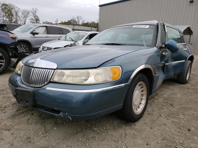 Photo 2 from auction – 2001 LINCOLN TOWN CAR E with VIN 1LNHM81W41Y630319