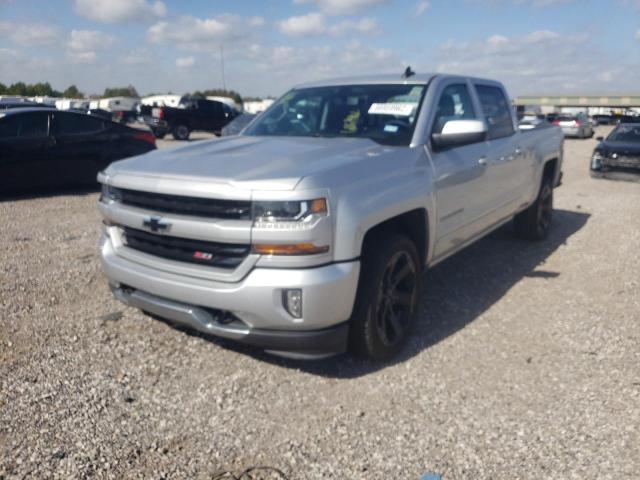 Photo 2 from auction – 2018 CHEVROLET SILVERADO with VIN 3GCUKREC1JG196787