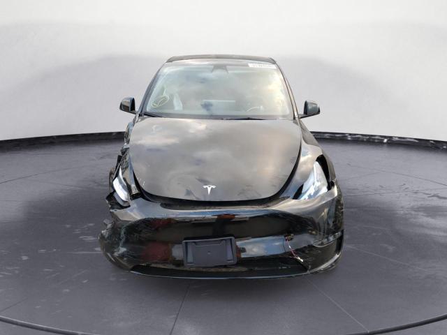 Photo 5 from auction – 2022 TESLA MODEL Y with VIN 7SAYGDEE6NF481491
