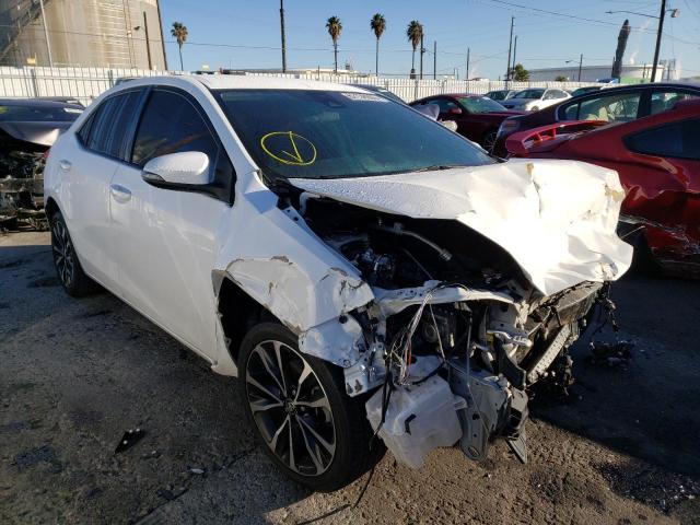 TOYOTA COROLLA L 2017 with VIN 5YFBURHE1HP611318 - Photo from auction