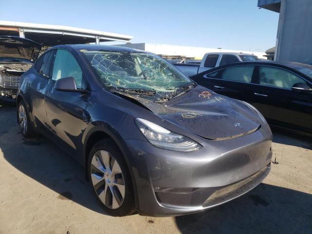 TESLA MODEL Y 2021 with VIN 5YJYGDEE0MF093488 - Photo from auction