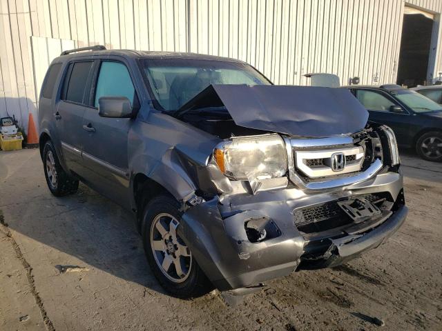 HONDA PILOT TOUR 2011 with VIN 5FNYF4H91BB005613 - Photo from auction