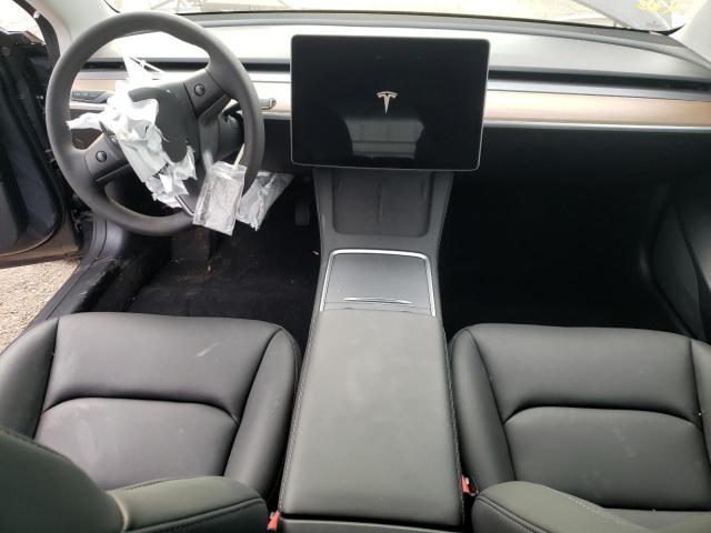 Photo 5 from auction – 2022 TESLA MODEL 3 with VIN 5YJ3E1EB8NF323767