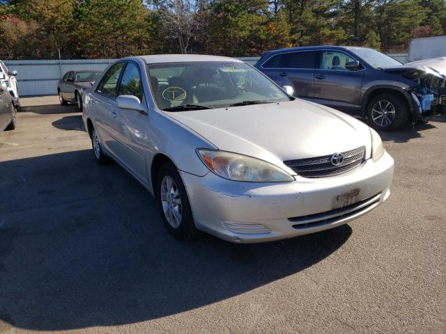 TOYOTA CAMRY LE 2004 with VIN 4T1BF32KX4U586319 - Photo from auction