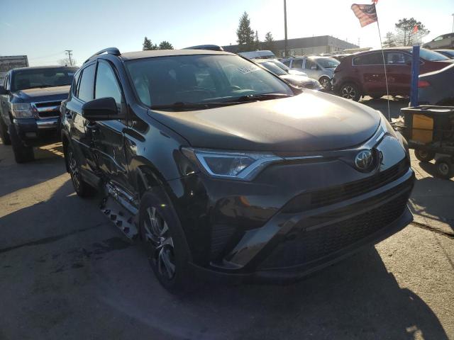 TOYOTA RAV4 LE 2018 with VIN 2T3ZFREV4JW493998 - Photo from auction