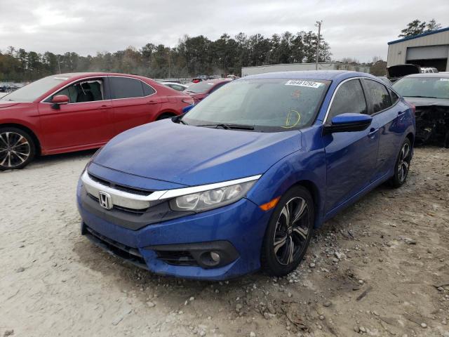 Photo 2 from auction – 2016 HONDA CIVIC LX with VIN 19XFC2F51GE008304
