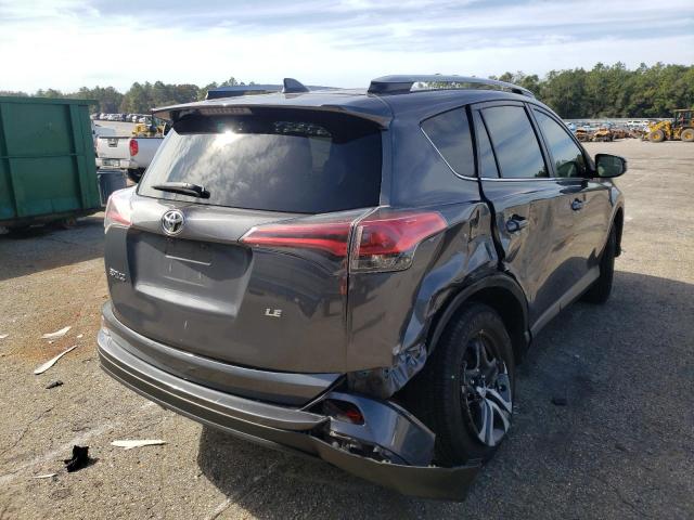 Photo 4 from auction – 2018 TOYOTA RAV4 LE with VIN JTMZFREV6JJ150396