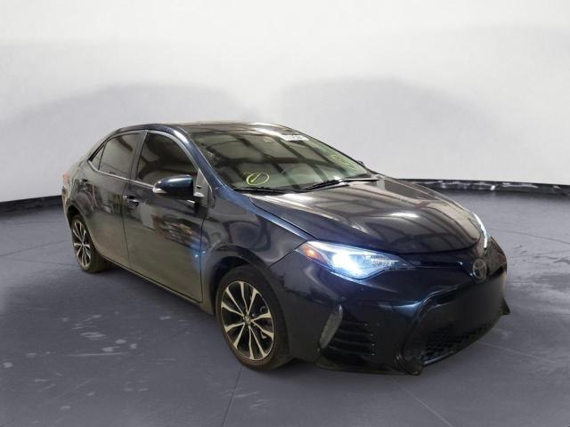 TOYOTA COROLLA L 2018 with VIN 5YFBURHEXJP777309 - Photo from auction