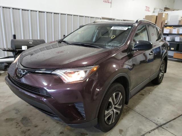 Photo 2 from auction – 2018 TOYOTA RAV4 LE with VIN 2T3ZFREV3JW518289