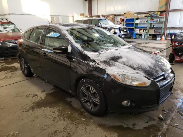 FORD FOCUS SE 2014 with VIN 1FADP3K21EL304088 - Photo from auction