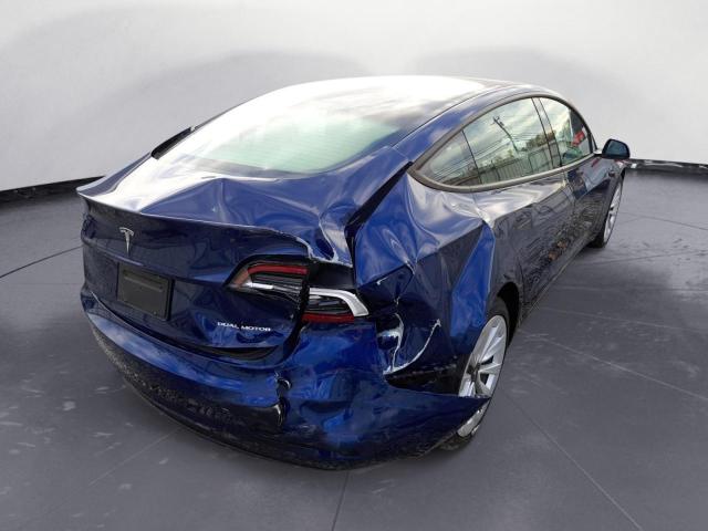 Photo 4 from auction – 2022 TESLA MODEL 3 with VIN 5YJ3E1EB6NF189230